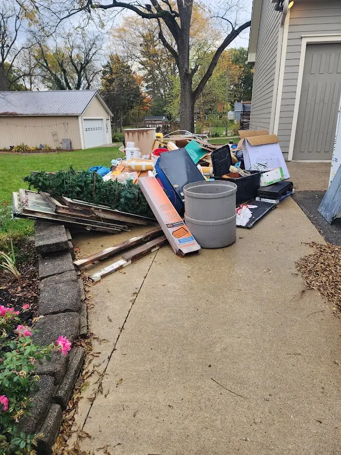 Dumpster being loaded with debris for 3 Yard Dumpster Rental in Brooklyn